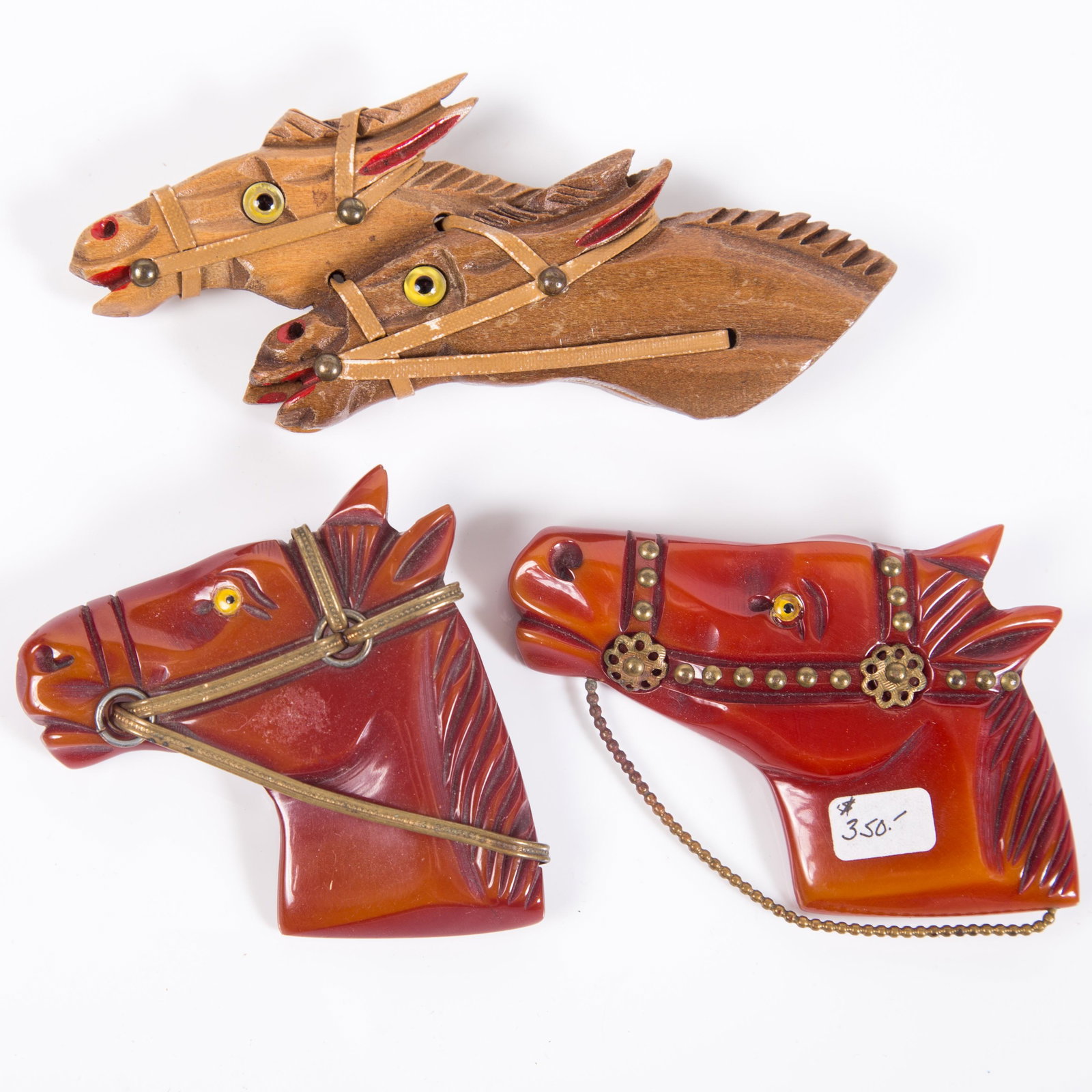 BAKELITE / WOOD HORSE PINS (3): Bakelite (2), wood (1); H-2 1/2", VG-EX