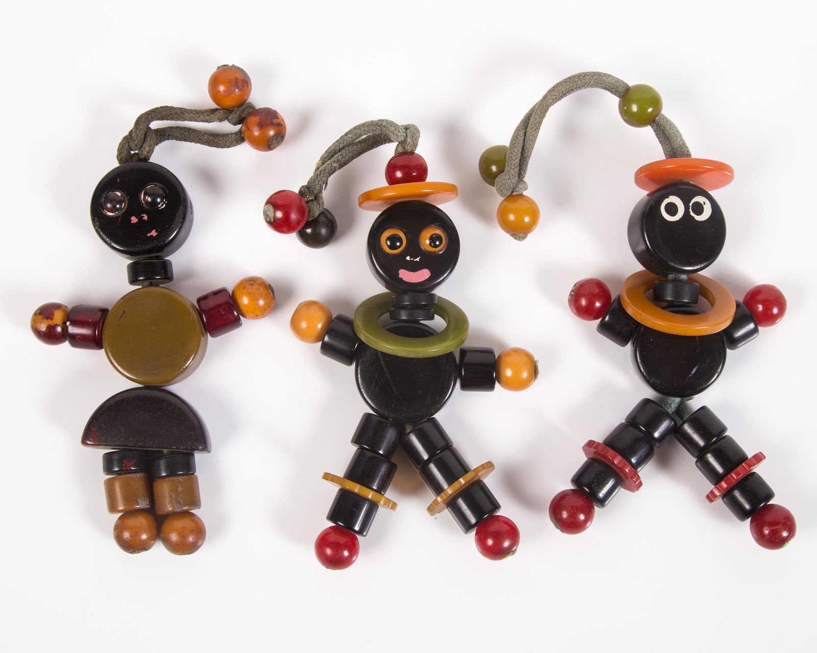 BAKELITE STRING TOYS (3): Some paint loss; H-7", F-G