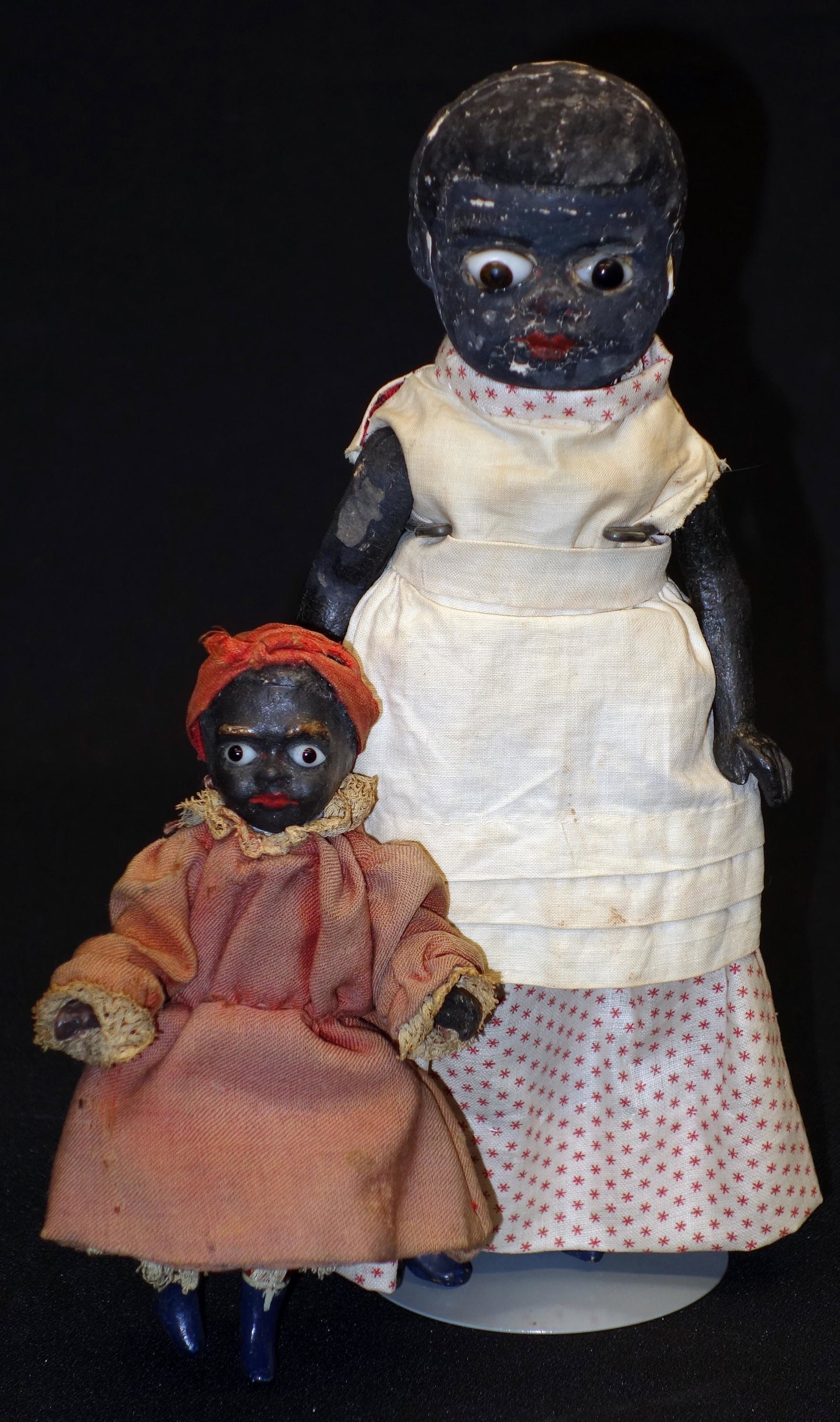 AFRICAN AMERICAN DOLLS (2): Papier mache heads, glass eyes; composition bodies; paint chipping and loss; H-9", P-G
