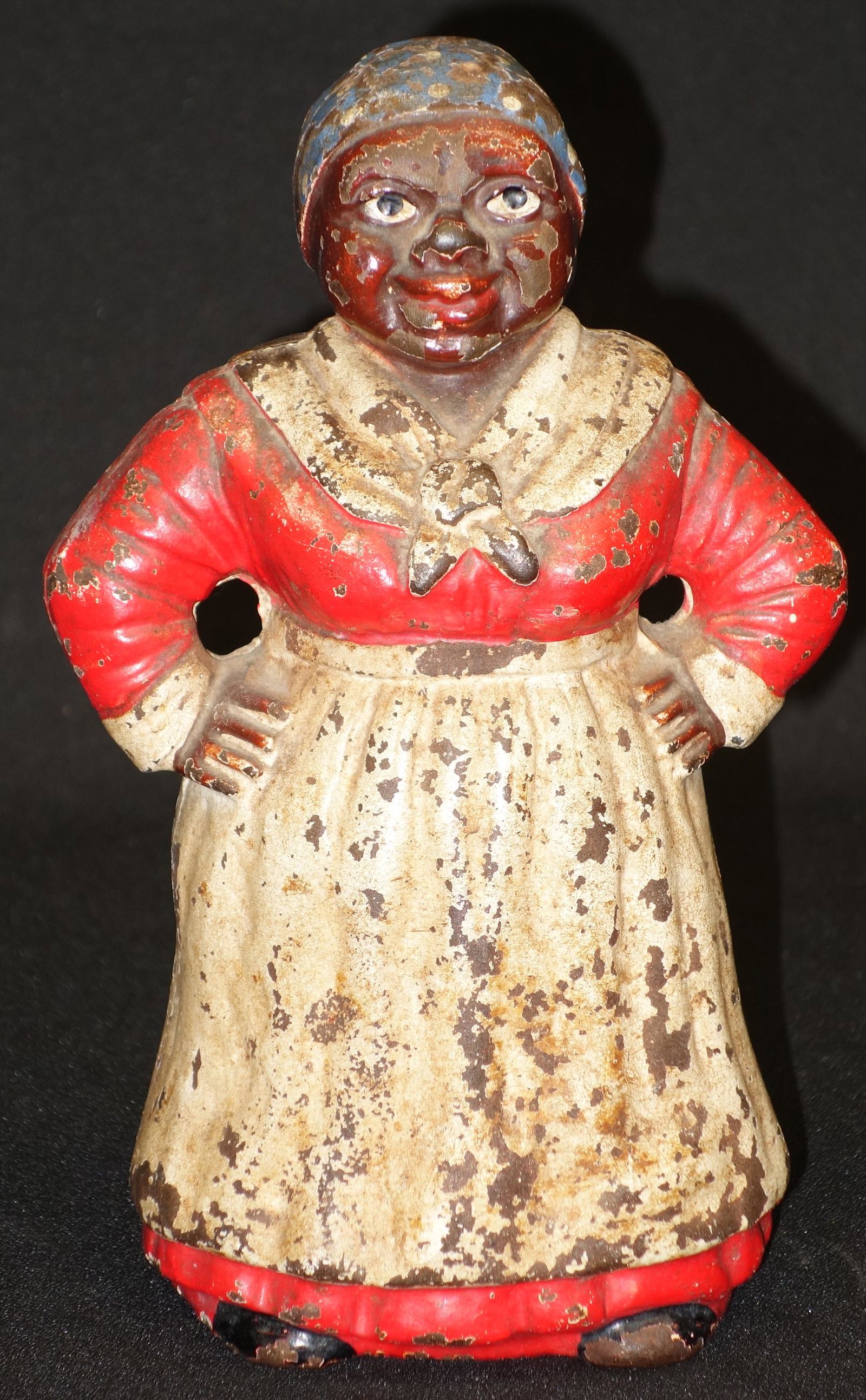 BLACK AMERICANA CAST IRON DOORSTOP: Paint wear, loss, chipping; H-9", P-F