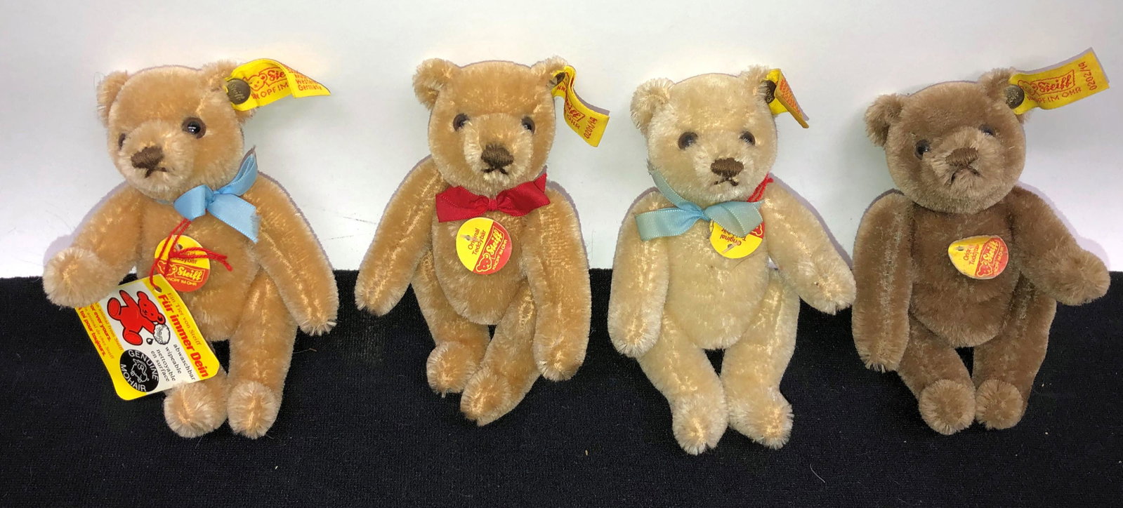 STEIFF BEARS (4): Ear button tags; chest tags; H-5"; normal wear; G-VG