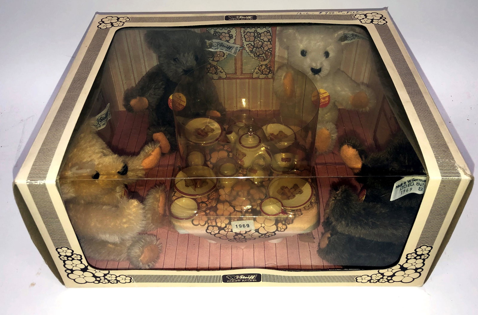 STEIFF TEDDY BEARS TEA PARTY: #1969; original unopened box; contains (4) H-5" bears; box dimensions- 5 1/4" x 12" x 9 1/4"; normal wear; G-VG