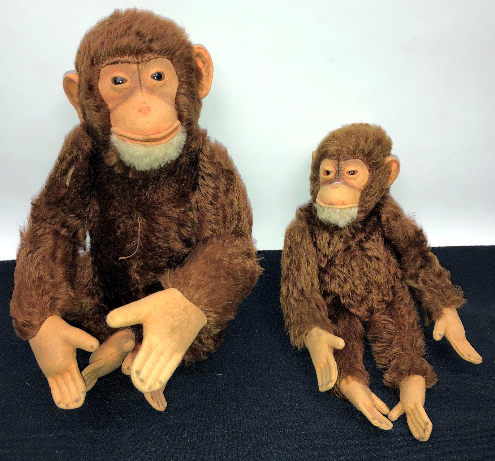 STEIFF MONKEYS (2): No ear buttons or tags; jointed bodies; H-11"-13"; normal wear; G-VG
