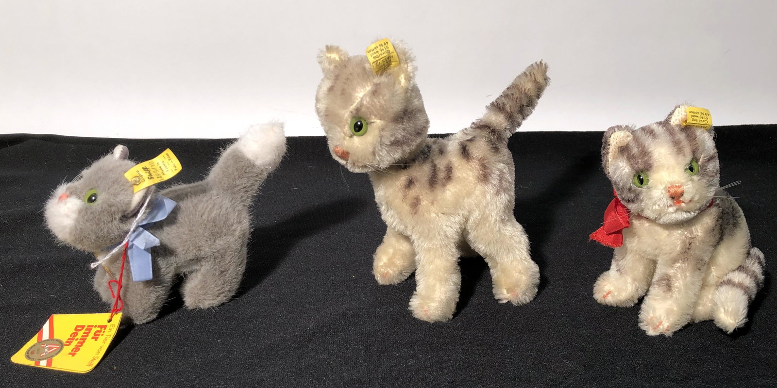 STEIFF KITTENS (3): Ear buttons and tags; H-5"-7"; normal wear; G-VG