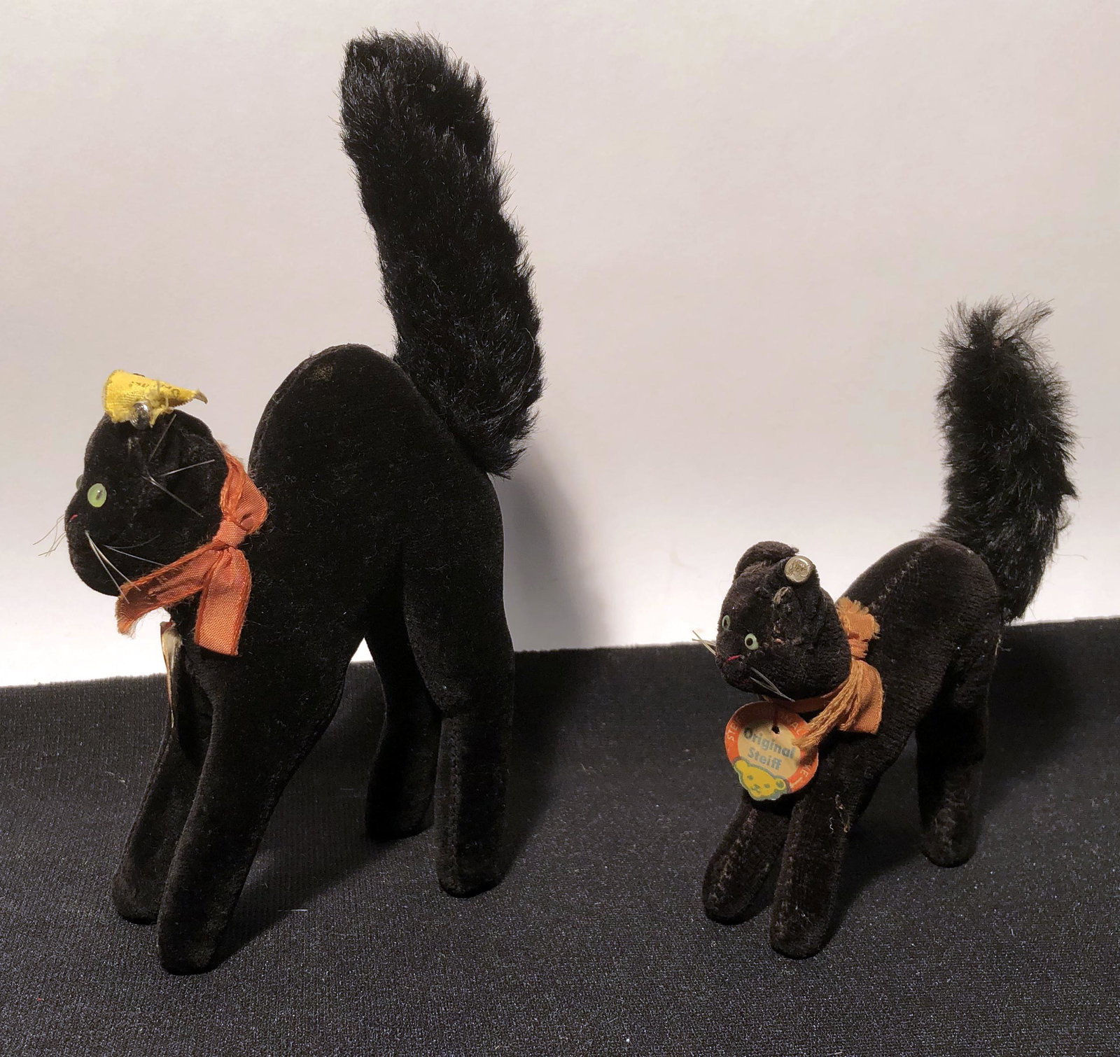 STEIFF BLACK CATS (2): Button tag; chest tag; H-4 1/2"-6 1/2"; normal wear; G-VG