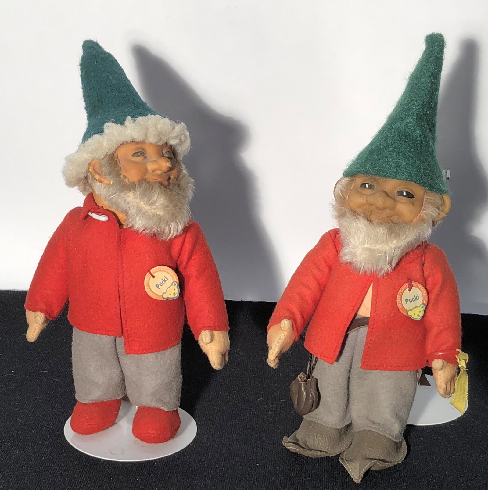 STEIFF "PUCKI" GNOMES (2): Chest tags; (1) has ear button and tag; possible hat replacement; damage to head/face; H-7"; F-G