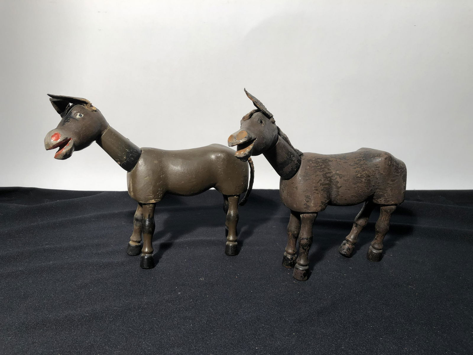 SCHOENHUT DONKEYS (2): (1) glass eyes; some paint loss; possible touch up paint; H-8"; G-VG