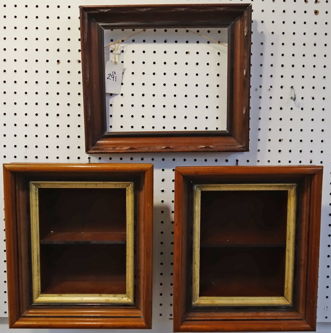 VICTORIAN FRAMES (3): Walnut; (2) deep well shadow box type; interior dimensions: 10" x 8"; outside dimensions: 14" x 12"; (1) carved; interior dimensions: 11" x 9"; outside dimensions: 15" x 13", G-VG