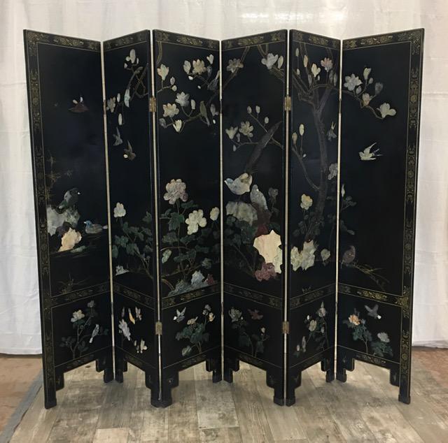 COROMANDEL SCREEN: Black lacquer front decorated with soapstone birds, leaves, etc. Back has foliate gilt decoration. G-VG. 72" x96"
