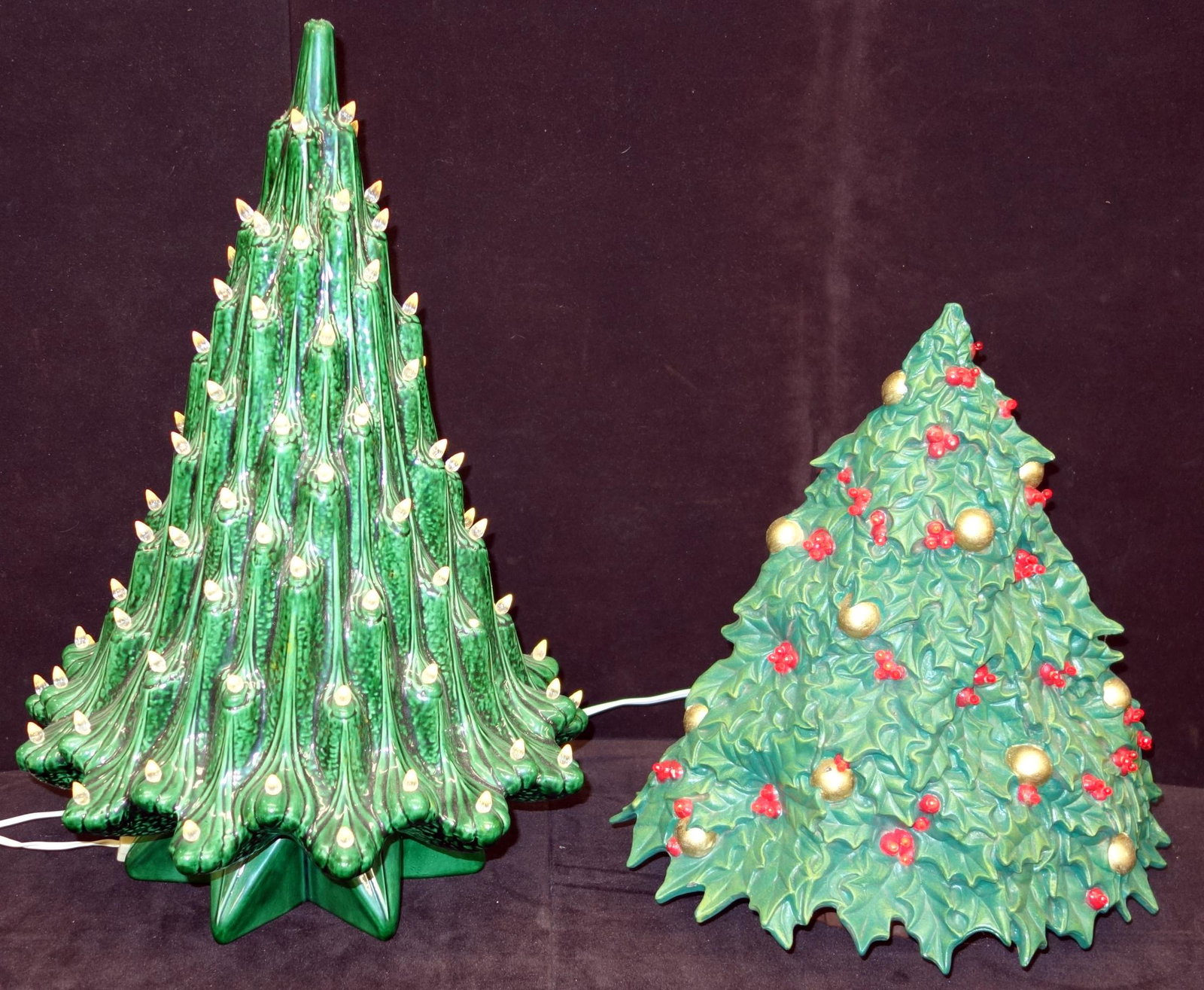 CERAMIC CHRISTMAS TREES WITH PLASTIC LIGHTS: Electric; taller tree has (2) missing plastic lights; bottom piece has a broken area around light bulb but doesn't show when set up; possible chip on top of tree; green glitter is glued on top; talles