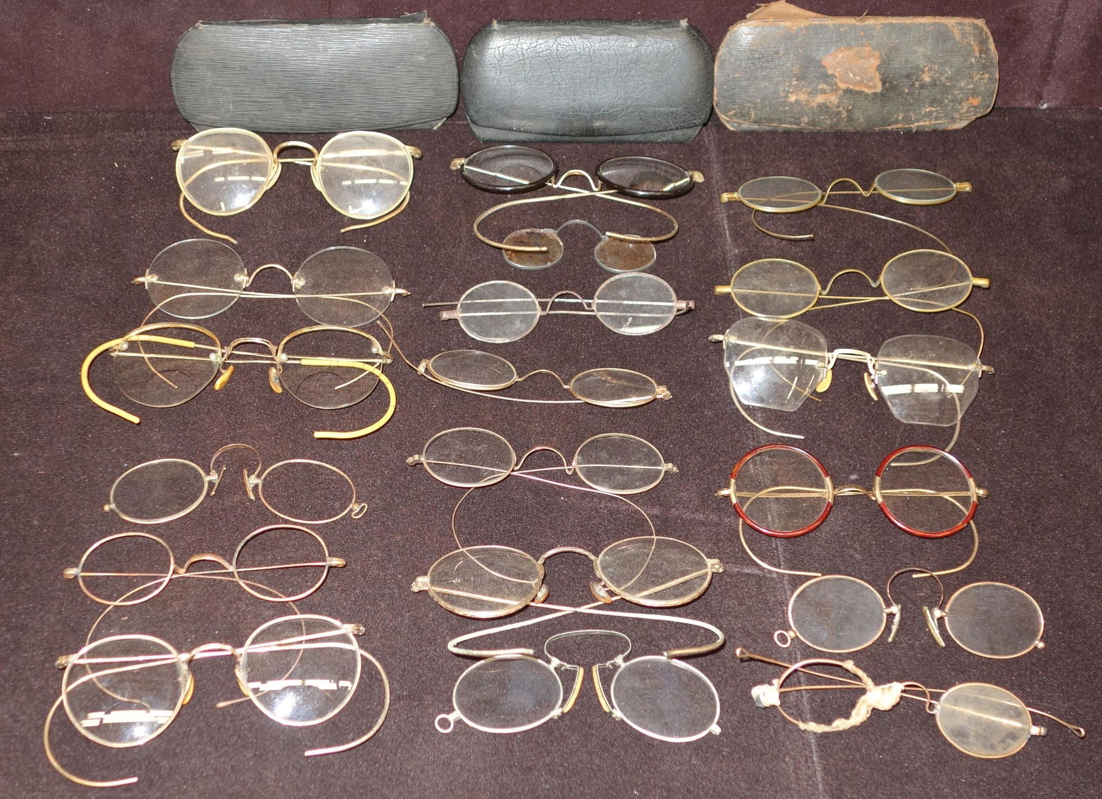 ANTIQUE EYE GLASSES (19): Most have metal frames, gold filled, etc. and glass lenses. (3) cases included. (4) lenses missing. (1) pair needs frame repair. Cases worn. L 5.25" G-VG