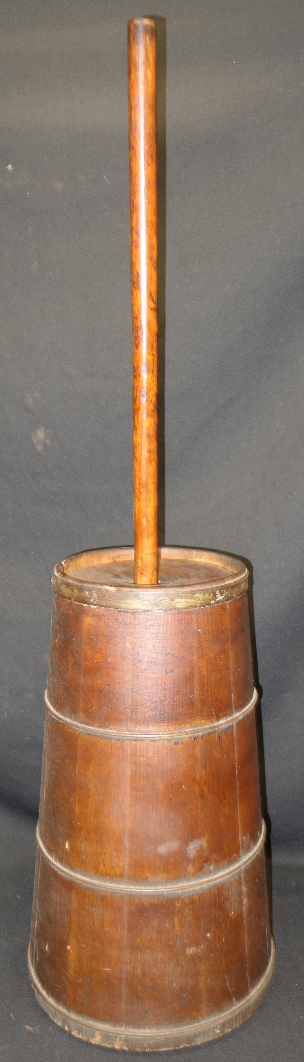 VINTAGE BUTTER CHURN: Wooden plank with metal straps; normal wear; cracks at pole base; loose wood at rim area; with some losses and chips; base has rim losses; H-41", G-VG