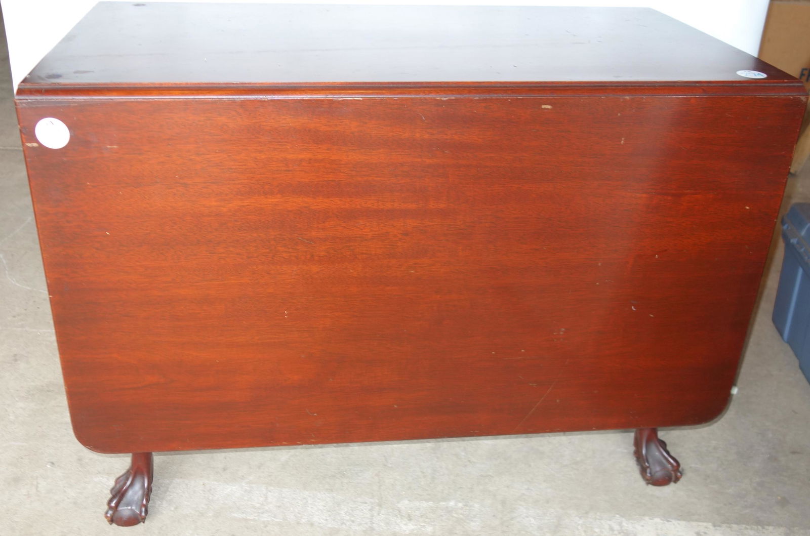 CHIPPENDALE STYLE DROP LEAF TABLE: Swing legs; ball and claw; normal wear; scratches; H-29", L-40", G