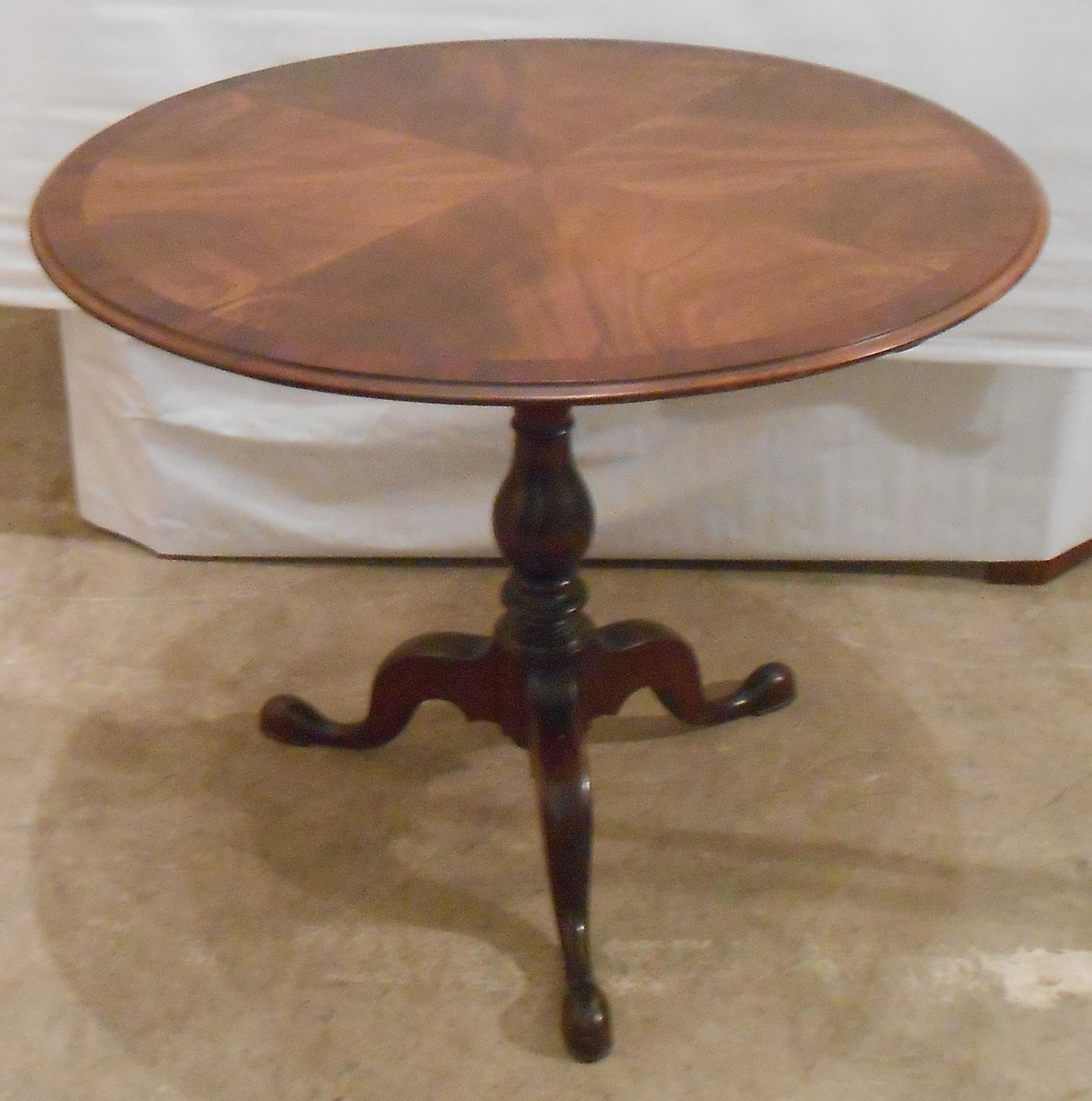 TILT TOP TABLE: Mahogany; birdcage; dovetailed; pedestal; top may be newer; normal wear; H-29", Dia.-36", G-VG