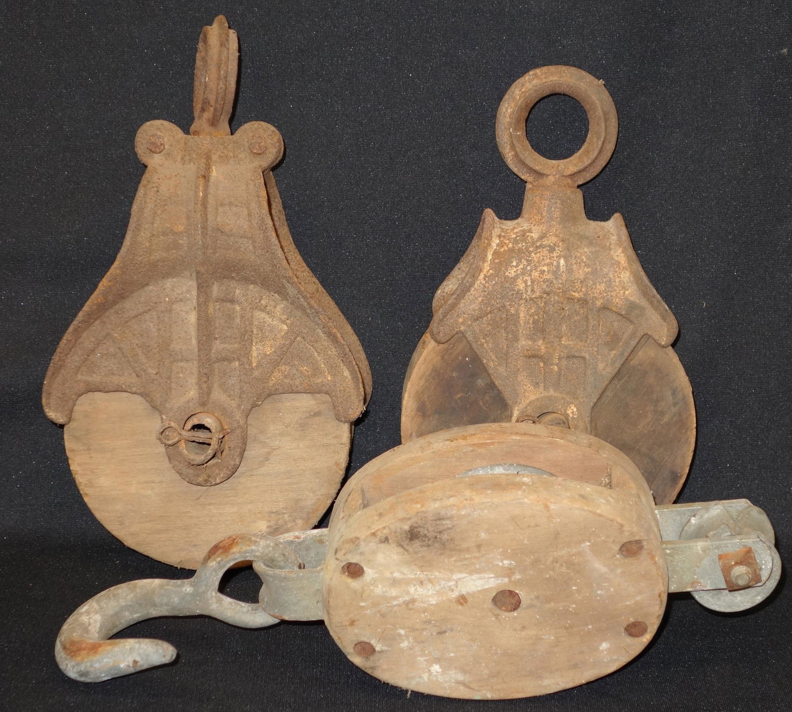 PULLY WHEELS (3): Metal and wood; wood shows splits; surface rust; (1) stamped "Myers", (1) stamped "Roller Bushed"; longest 14", G-VG