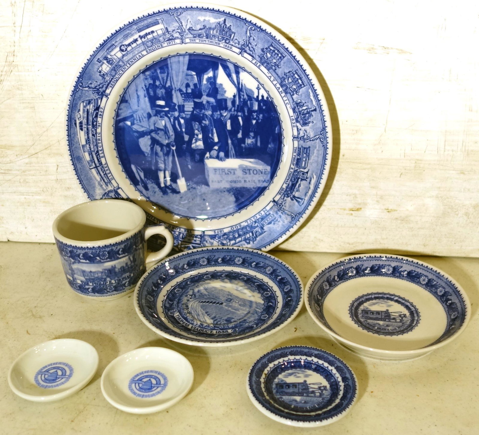 B&O CHINA SHENANGO (7) PCS.: (1) Sesquisentennial plate, (2) butter pats, (1) butter pats, (1) cup & saucer, (1) saucer; plate Dia.-10", G-VG