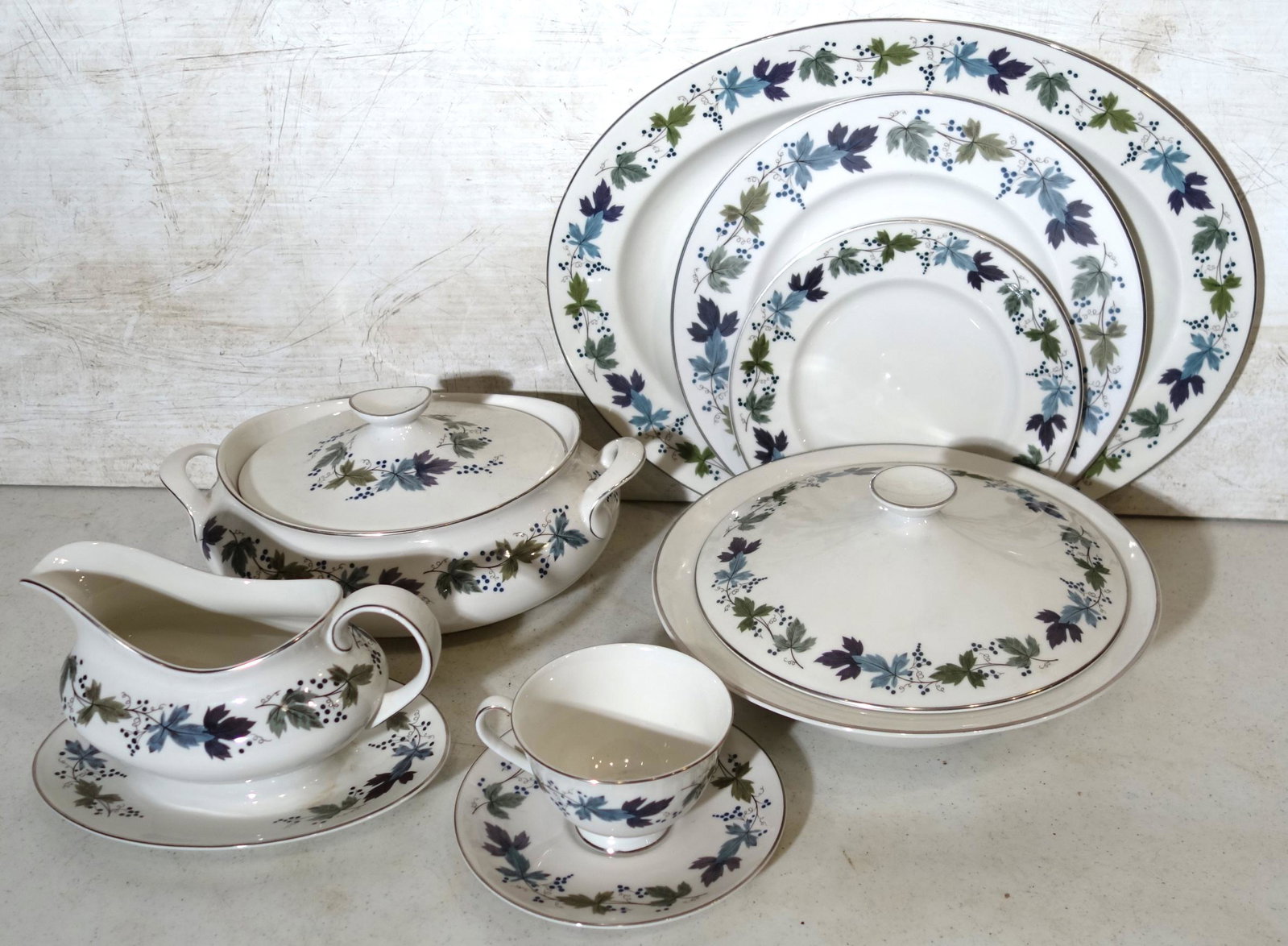 ROYAL DOULTON TABLE SERVICE (74+/-) PCS.: English translucent china "Burgundy"; (2) covered dishes, gravy boat; platter; plates, etc.; longest L-16", VG-EX