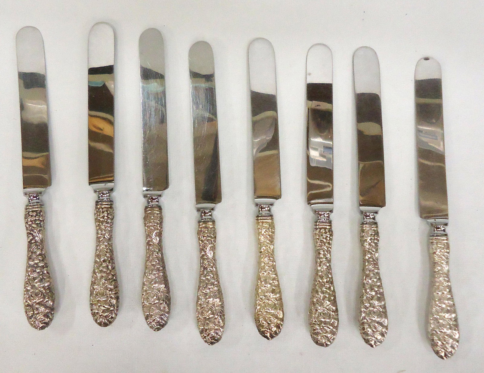STERLING HANDLED DINNER KNIVES (8): Wade & Butcher repousse no monogram. 9"L; VG-EX