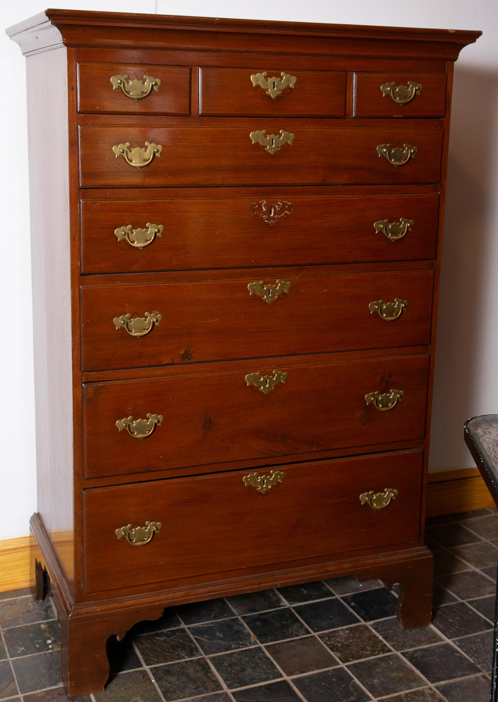 WALNUT TALL CHEST: (3) drawers over (5) long drawers. Bracket feet. Pine secondary wood. Replaced Brasses. Minor repairs. H-63" W-42" D-24" G-VG