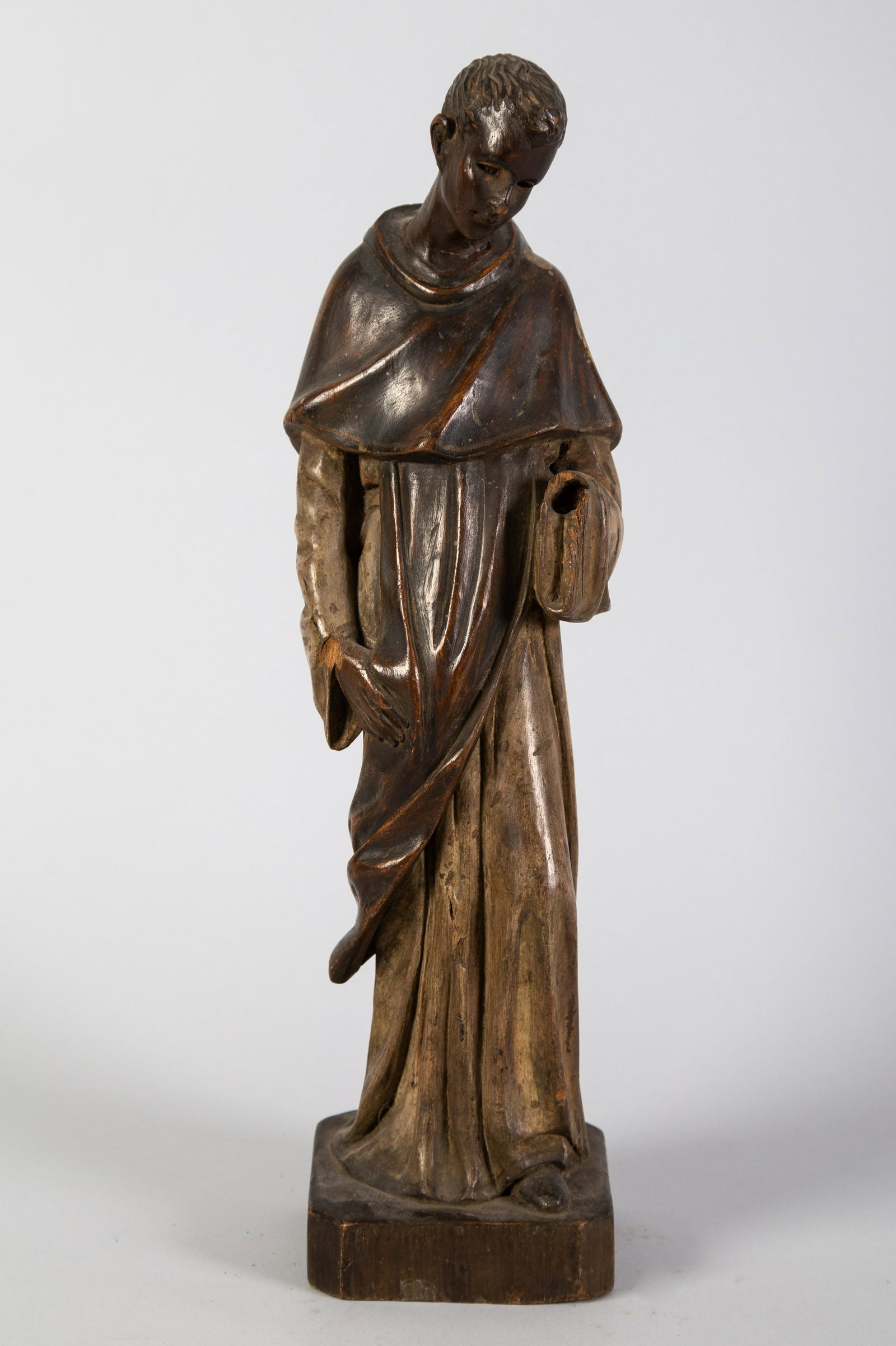 RELIGIOUS CARVINGS (2): (1) Young priest/monk. (1) plaque-oak. Missing hand. Wear. H14-18" F-G