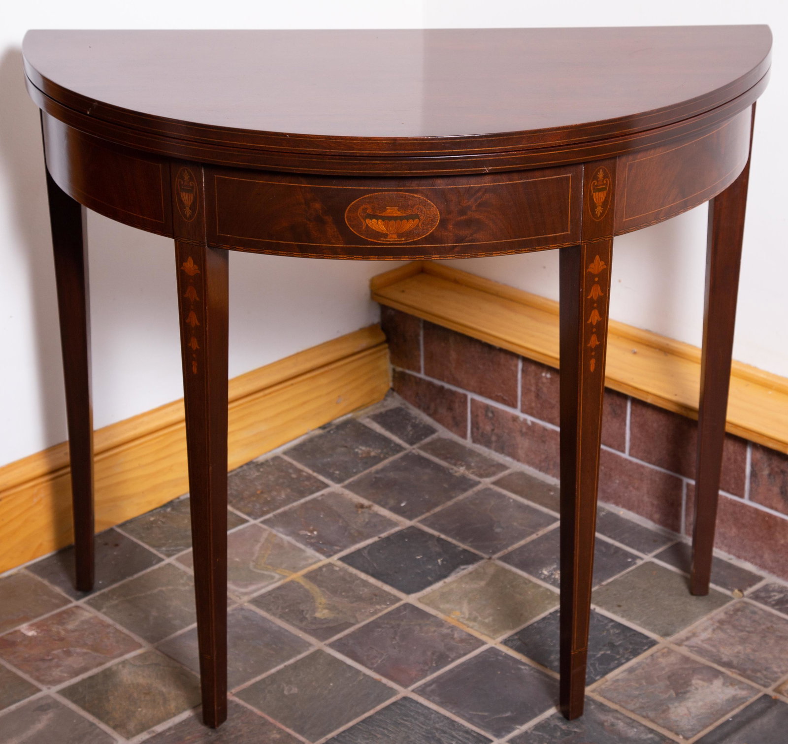 HEPPLEWHITE STYLE GAMES TABLE: Mahogany-inlays of urns, bell flowers. H-30" W-36" Normal wear & scratches. G-VG