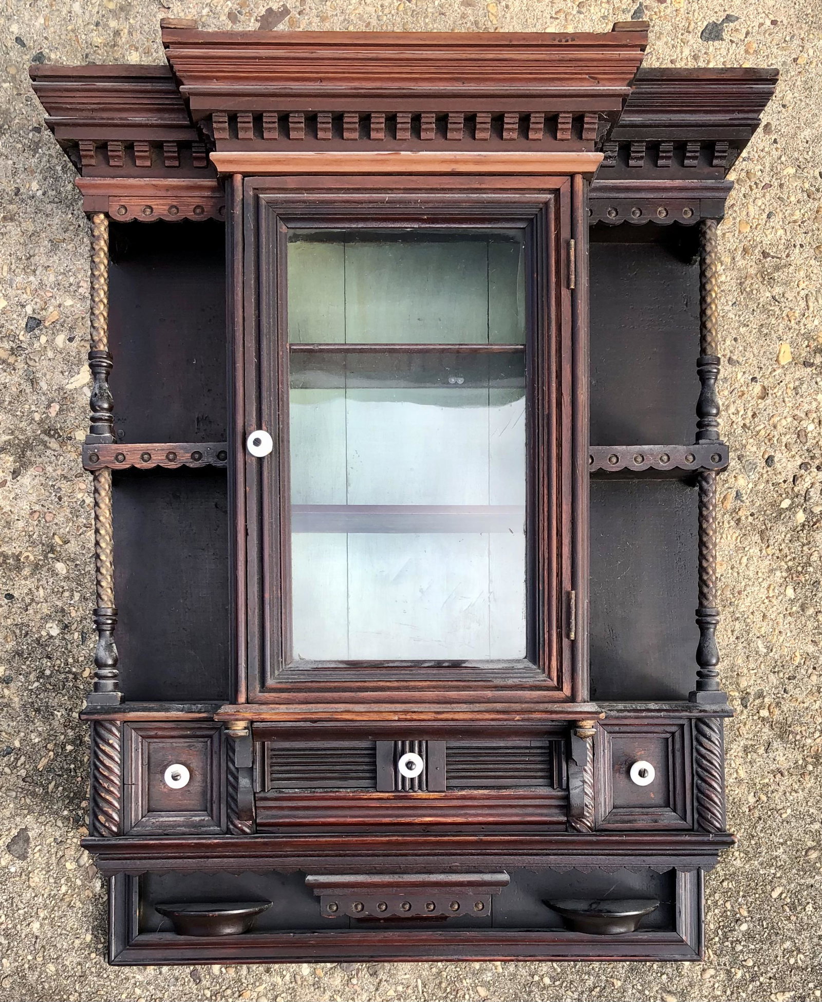 VICTORIAN CURIO SHELF: Walnut-hanging shelf. Central door. H29" W23" Normal wear. Small losses. G-G+
