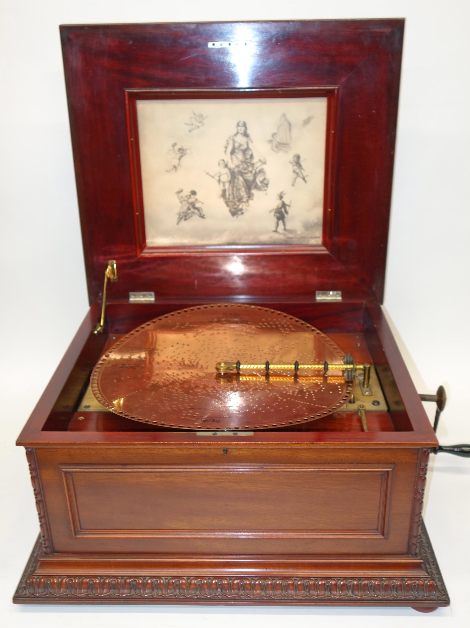 REGINA DISC MUSIC BOX: 15" disc, double comb, mahogany case, plays; together with (38+/-) mostly Regina discs; case 20" x 22", VG-EX