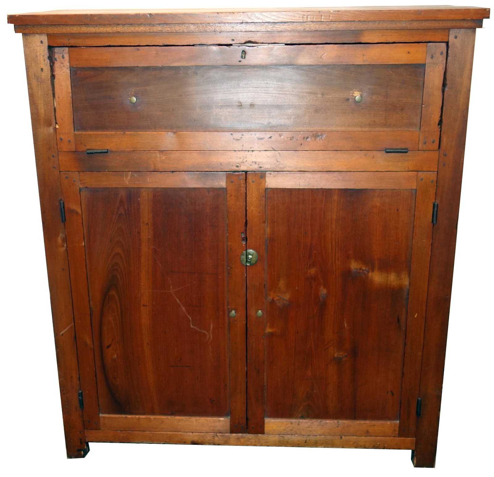 COUNTRY CUPBOARD / BUTLER'S DESK: Mixed wood; drop front drawer with slide out writing surface and well; (2) lower paneled doors; paneled ends; some checking and wear; H-49", W-44", G-G+