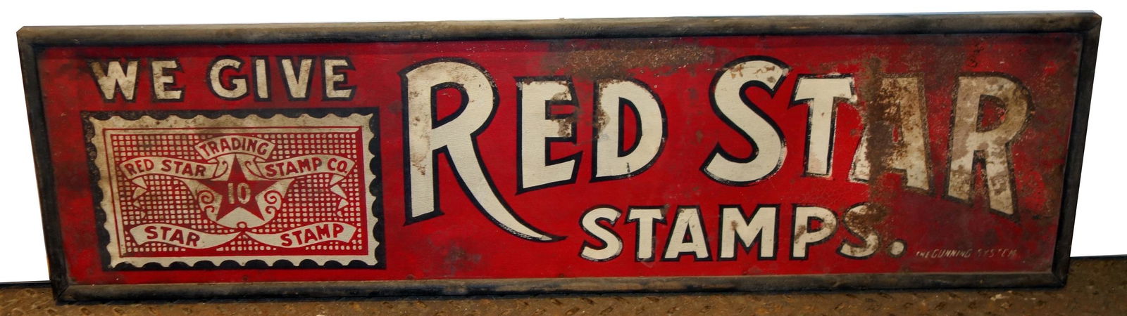 "RED STAR STAMPS" SIGN: Painted tin in wood frame; (1) sided; rust and loss; H- 13"; L- 48"; F-G