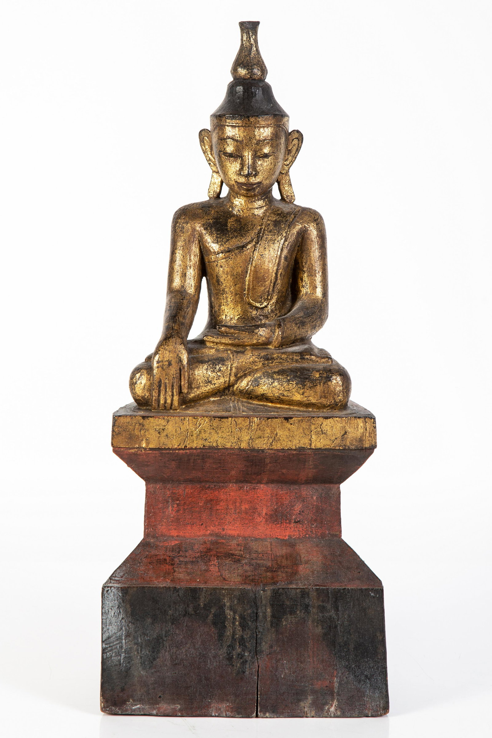 THE BUDDHA: Burma or Northern Thailand, early 20th century; carved, gilt and painted wood; normal wear; H-17", G-VG