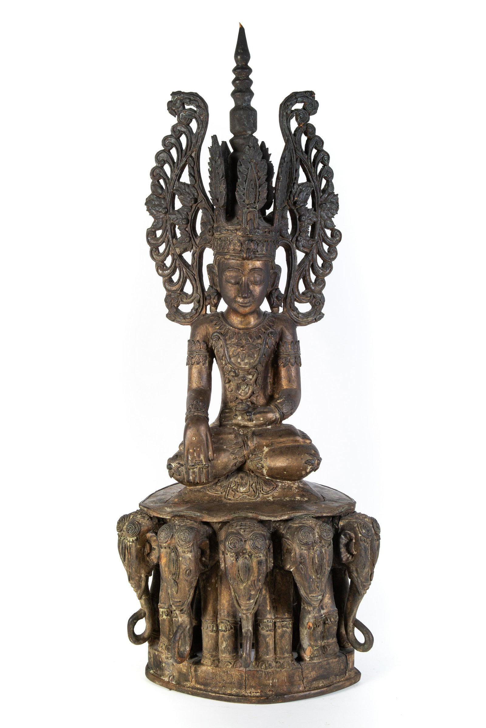 THE BUDDHA: Buddha supported on five elephants; Northeast Thailand; first half of 20th Century; carved, gilt and painted wood; normal wear; H-39", G-G+