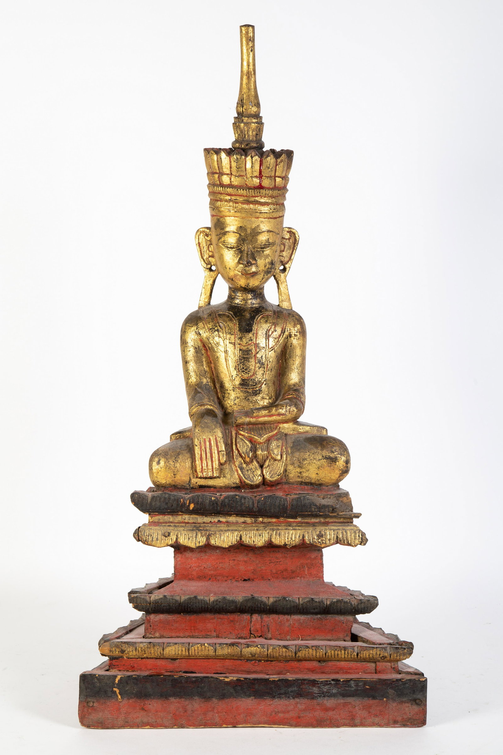 NORTHERN THAI SEATED BUDDHA: First half of 20th Century; carved gilt and painted wood; normal wear; H-28", G-VG