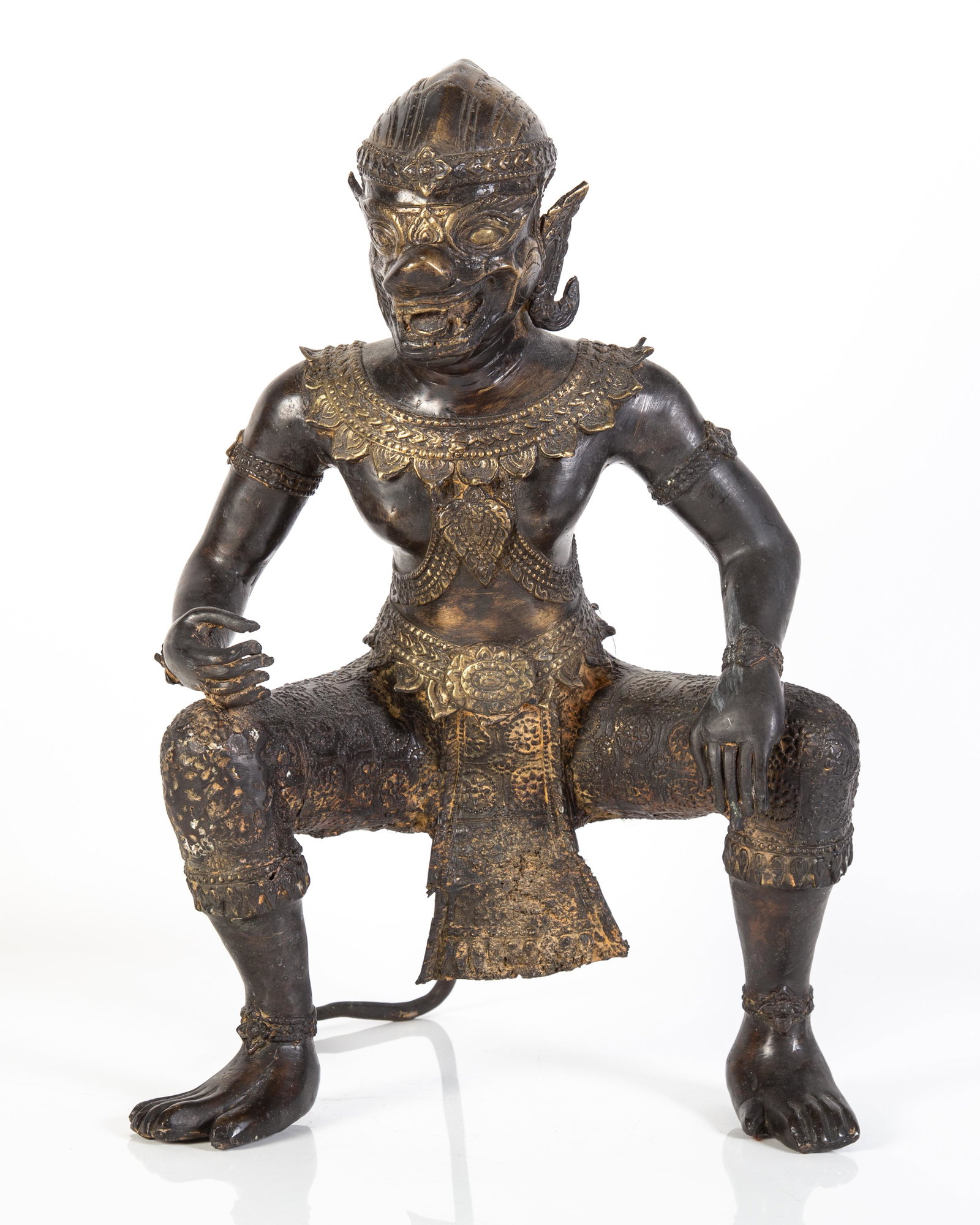 BUDDHIST GUARDIAN DIVINITY: Late 20th century; bronze; weathered; H-17", G-G+