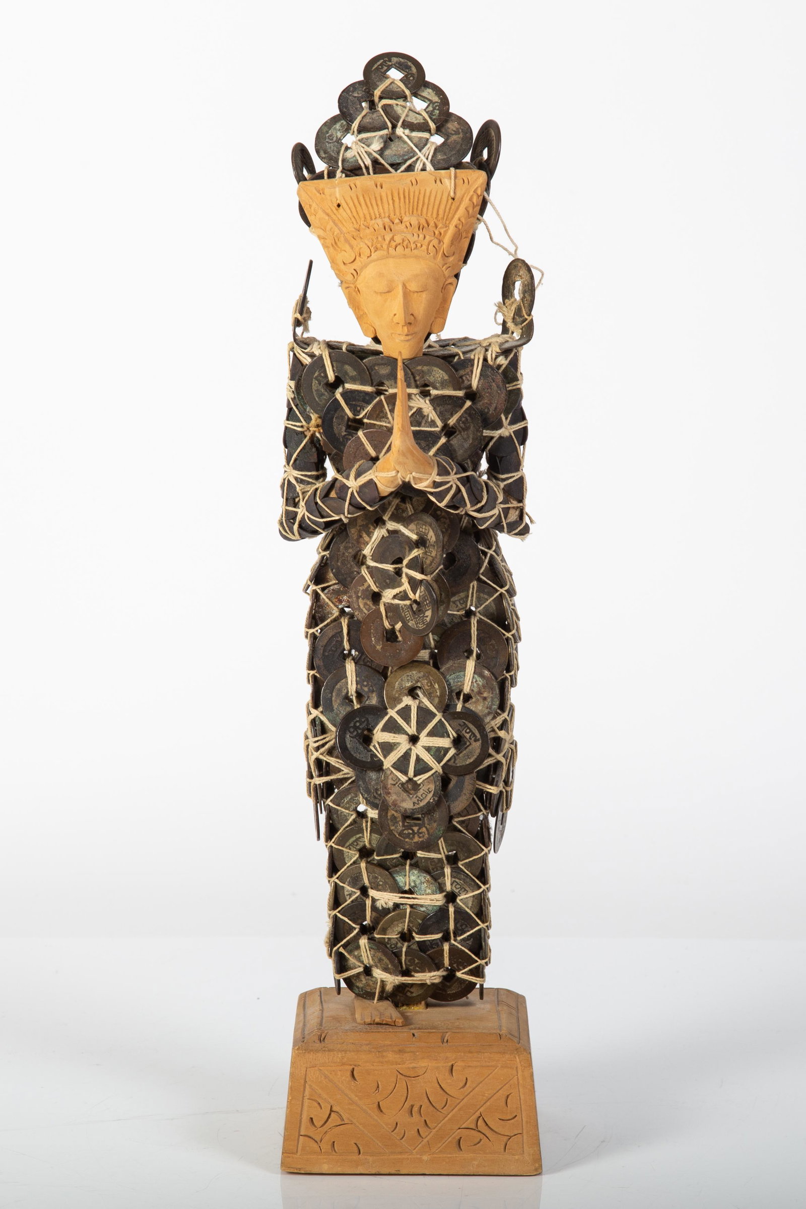 ASIAN COIN-ORNAMENTED FIGURE: Indonesian carved wood and Chinese coin good fortune charm; late 20-th century; missing (1) foot; normal wear; H-16", G-VG