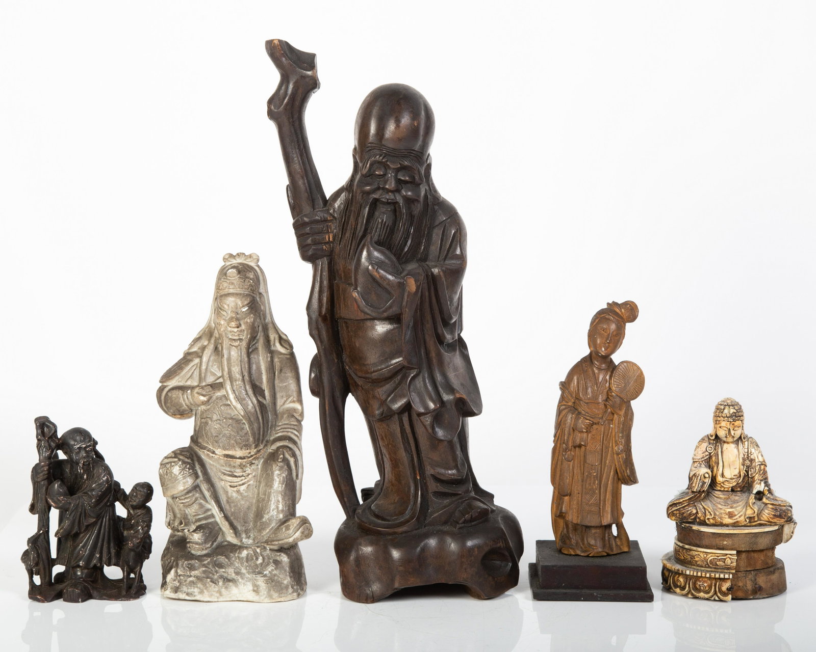 JAPANESE & CHINESE FIGURES (5): (1) Chinese Blanc de Chine God of War, 19th Century; (1) Japanese bone Buddha, 19th Century (as is); (1) Chinese boxwood lady, early 20th Century; (1) Chinese soapstone group, God of Longevity, 20th C