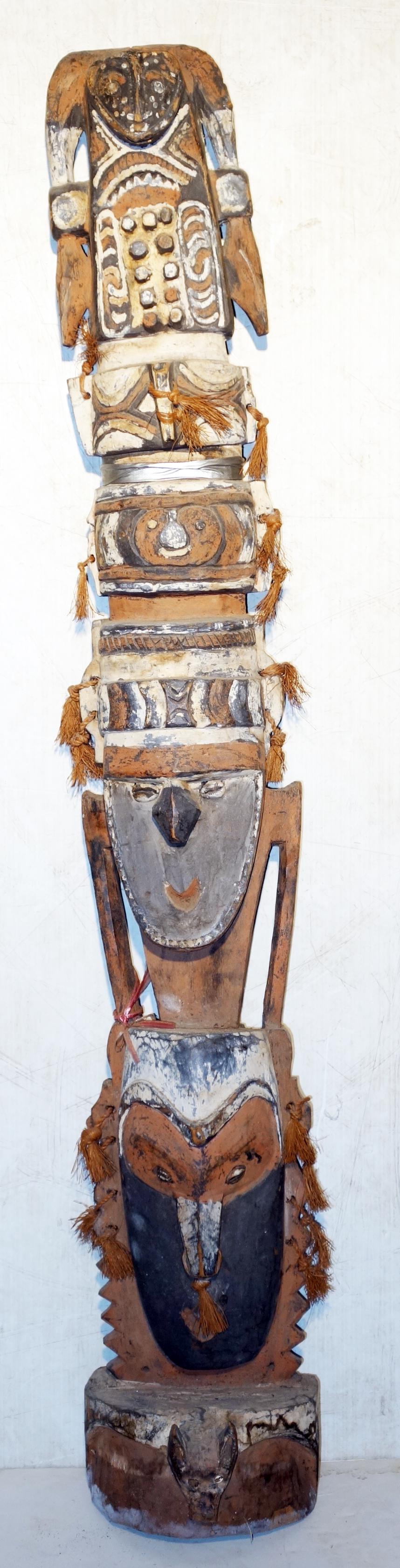 NEW GUINEA CARVED & PAINTED TOTEM MASK: Wood with raffia, etc.; normal wear, losses; 55" x 9", G-VG