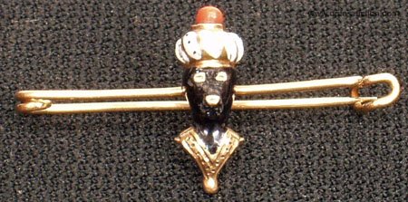 GOLD BLACKAMOOR PIN: GOLD BLACKAMOOR PIN - Coral topped, enameled turban and face, some enamel damage, L-1 1/2", F-G