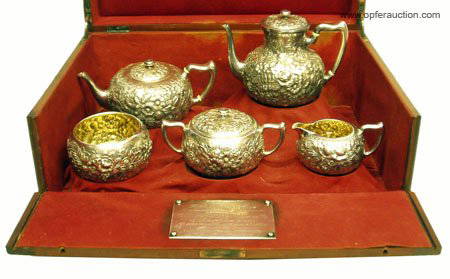 REPOUSSE STERLING TEA & COFFEE SERVICE: REPOUSSE STERLING TEA & COFFEE SERVICE - Whiting, presented to R. Allison Miller Penn Mutual Life Insurance Co. 6th Annual Meeting 1889; in fitted J.E. Caldwell box, some wear, 64 TO; Teapot H-6 1/2",