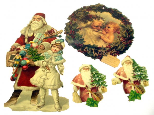 (8) VICTORIAN STYLE CHRISTMAS DIECUTS: (8) VICTORIAN STYLE CHRISTMAS DIE-CUTS - Paper litho; (2) Santas holding tree, Welcome Wreath is new; Santa with girl in white coat; edge roughness with minor creasing and tearing overall; hand torn o