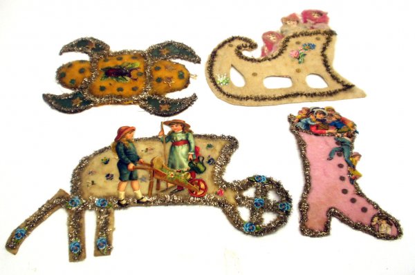 (4) VICTORIAN HOLIDAY DECORATIONS: (4) VICTORIAN HOLIDAY DECORATIONS - Paper litho, batting and tinsel; boot, beetle, wheelbarrow & sleigh; some creasing, tears and wear; L-16", G-VG