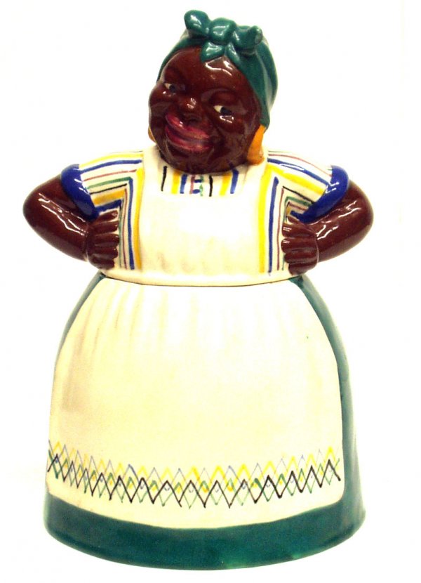 BRAYTON LAGUNA MAMMY COOKIE JAR: BRAYTON LAGUNA MAMMY COOKIE JAR - Painted ceramic pottery, signed on bottom; minor chips on bottom edge; 1 1/2" hairline on top left of bottom piece; minor chips on bow (top of head); glaze flake over