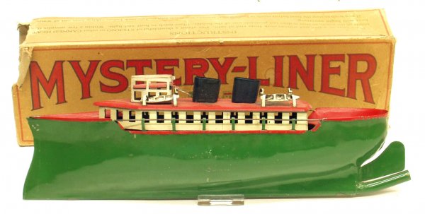 MYSTERY LINER BOAT: MYSTERY LINER BOAT - Universal Tool & Die Co.; painted pressed steel; Sterno powered; partial original box fair; roof of boat has a burn spot; some minor scratches; missing (2) lifeboats; L-13 1/2", G