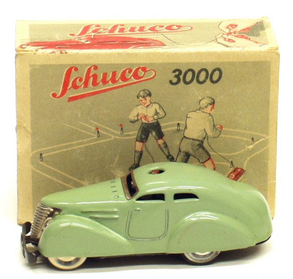 SCHUCO 3000 CAR: SCHUCO 3000 CAR - German; painted metal; mechanical; working; original box torn, box F-G; appears to be complete with instructions; L-4 1/2", EX-NM