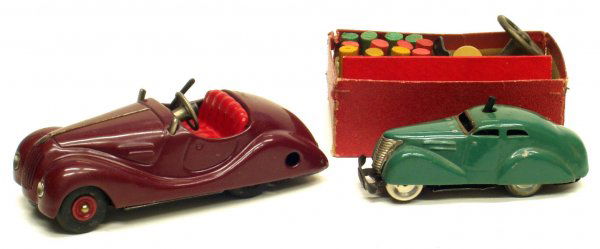 (2) SCHUCO CARS: (2) SCHUCO CARS - German, painted metal, mechanical; (1) 3000 with original box bottom, missing (1) sign, not working; (1) 2002 Akustico: missing windshield, working; L-4 1/2" - 5 1/2", G-VG