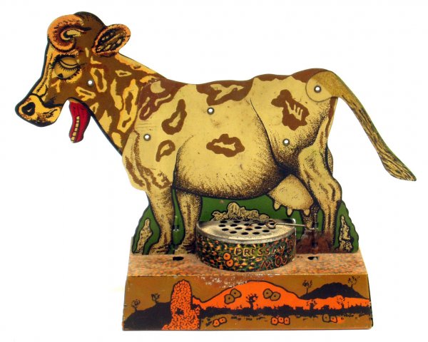 ARTICULATED COW TOY: ARTICULATED COW TOY - Litho tin; lift tail to activate mouth, eyes, bellows; bellows need patching; some rust on back feet; L-10", F