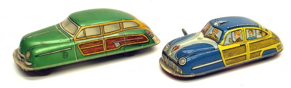 (2) MARX WOODY WAGON AUTOS: (2) MARX WOODY WAGON AUTOS - Litho tin; mechanical; working; wood wheels; normal wear and scratches; L-6 1/2" - 7 1/2", G-VG