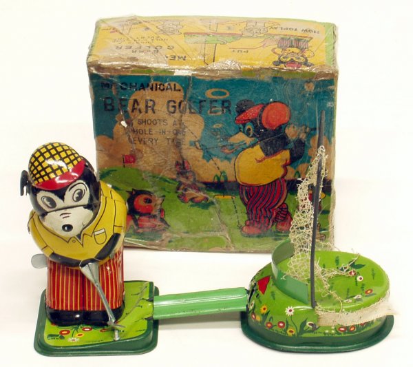 JAPANESE BEAR GOLFER: JAPANESE BEAR GOLFER - T.P.S., Litho tin, mechanical, working; original box is torn and taped, box is P-F; net is deteriorated, toy otherwise EX; H-4 1/2"