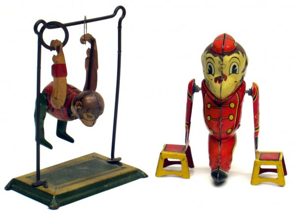 (2) TIN MONKEY TOYS: (2) TIN MONKEY TOYS - Litho tin; (1) Marx Tumbling Monkey with chairs: working; some wear and litho tloss; (1) Tumbling Monkey Acrobat: working, normal wear and dirt; H-5"-6", G-VG