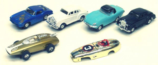 (5) SLOT CARS: (5) SLOT CARS - H.O. Scale; (3) Lionel Jaguar and Rolls Royce; (2) Tyco Corvette and race car; (1) Tyco race car shell; L-2 1/2"-3", G-VG