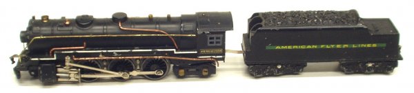 AMERICAN FLYER LOCOMOTIVE: AMERICAN FLYER LOCOMOTIVE and TENDER - Painted metal; normal wear; some wheel fatigue; engine L-12", VG